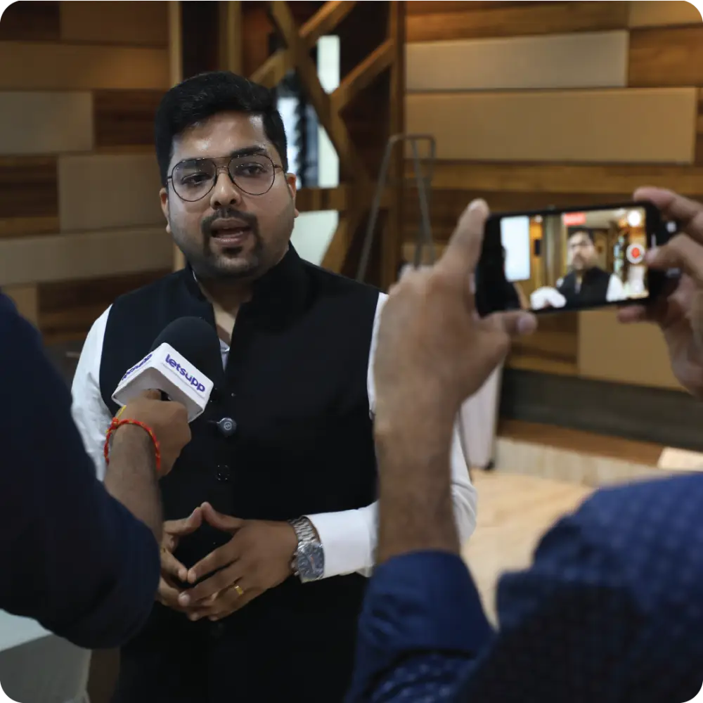 Abhay Agarwal being filmed at an event