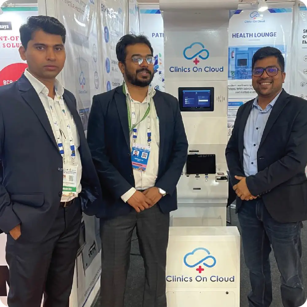 Four colleagues beside a Health ATM
