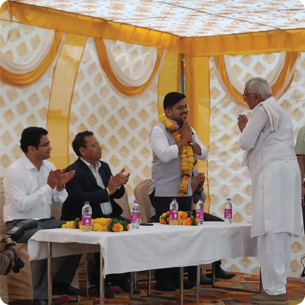 A ceremonial dais with guests seated at a launch