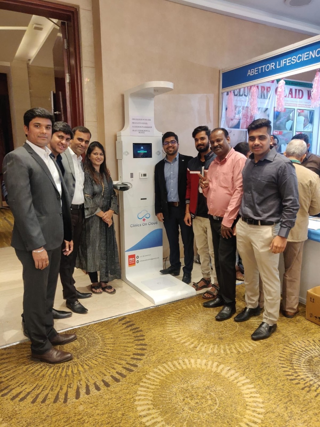 The team beside a Health ATM at an installation