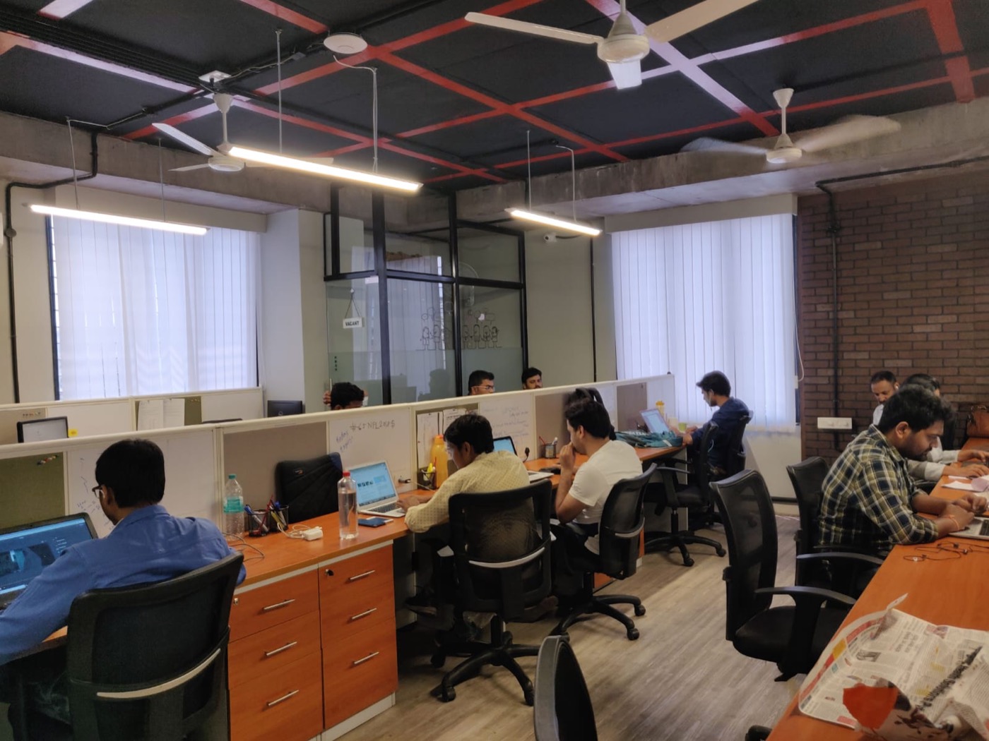 The first office, desks in rows