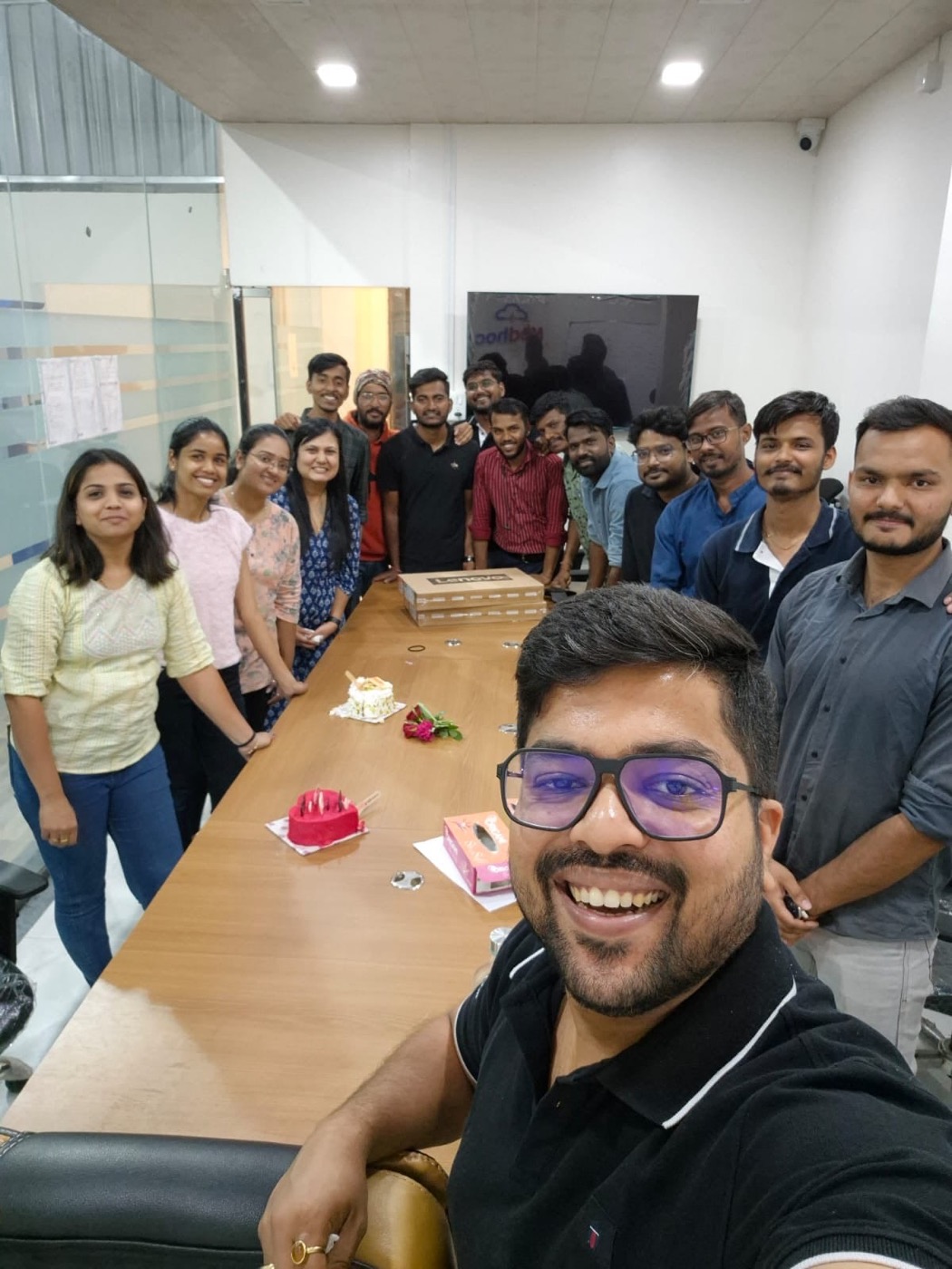 The team around a table in the office