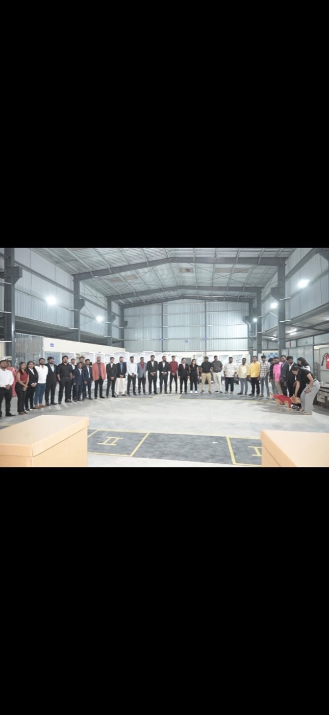 A large team gathered inside the facility