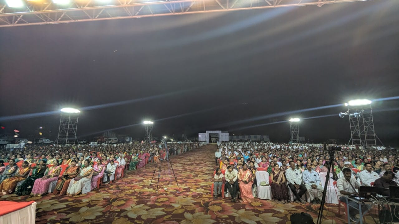 A large outdoor gathering at night